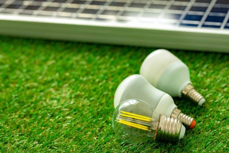 Solar energy panel and light bulb, green energy